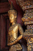 Chiang Mai - The Wat Phra Singh temple. Detail of the entrance door of the ubosot (ordination hall). 